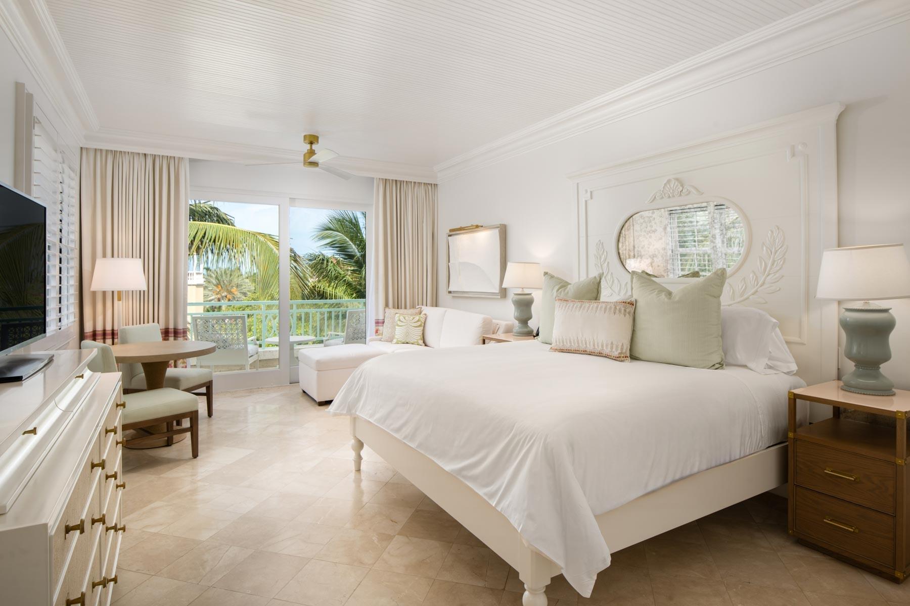 The Palms Unit 2401/02 renovated bedroom with balcony and garden view, Grace Bay, Turks and Caicos
